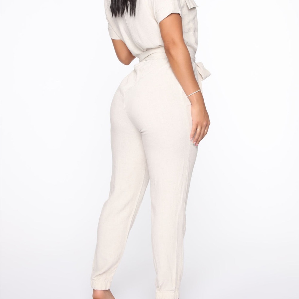 Oatmeal jump suit new with tags size medium